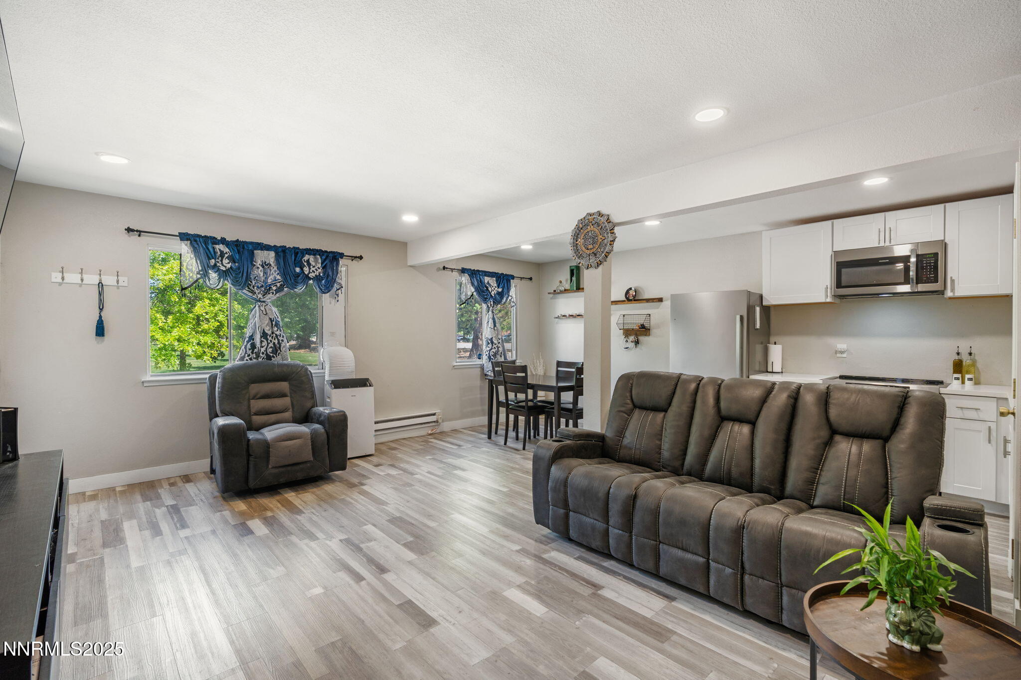 940 Jamaica Avenue, Unit 3 Reno, NV 89502 - Photo 6 of 29 a living room with furniture and a wooden floor