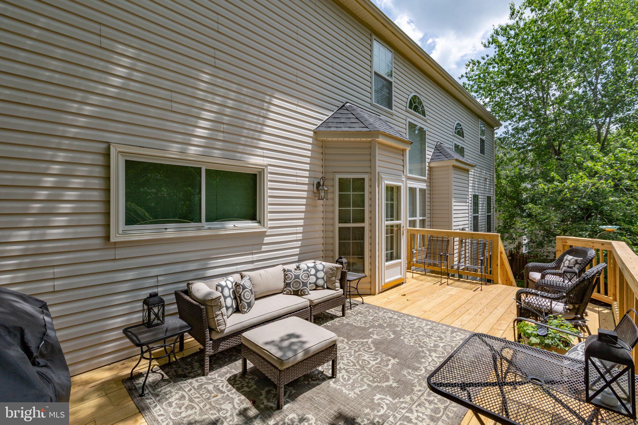 24 Tavern Road Stafford, VA 22554 - Photo 16 of 31 Bay windows and door exit onto deck with stairs