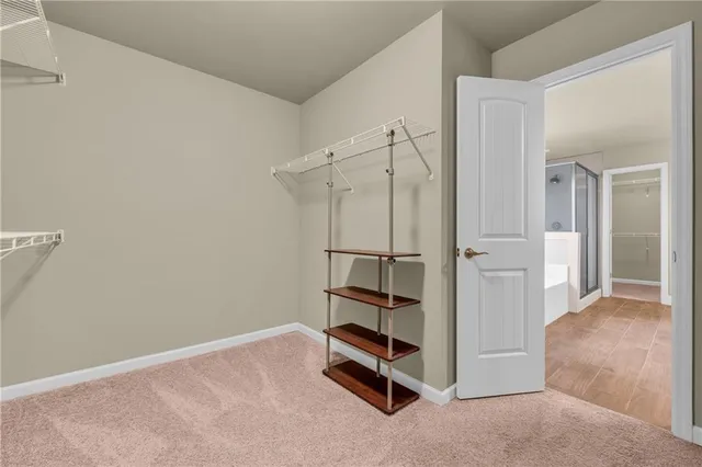 a view of a kitchen from the hallway