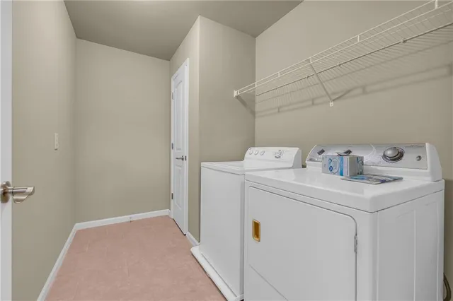 a swimming pool with an outdoor space and seating area