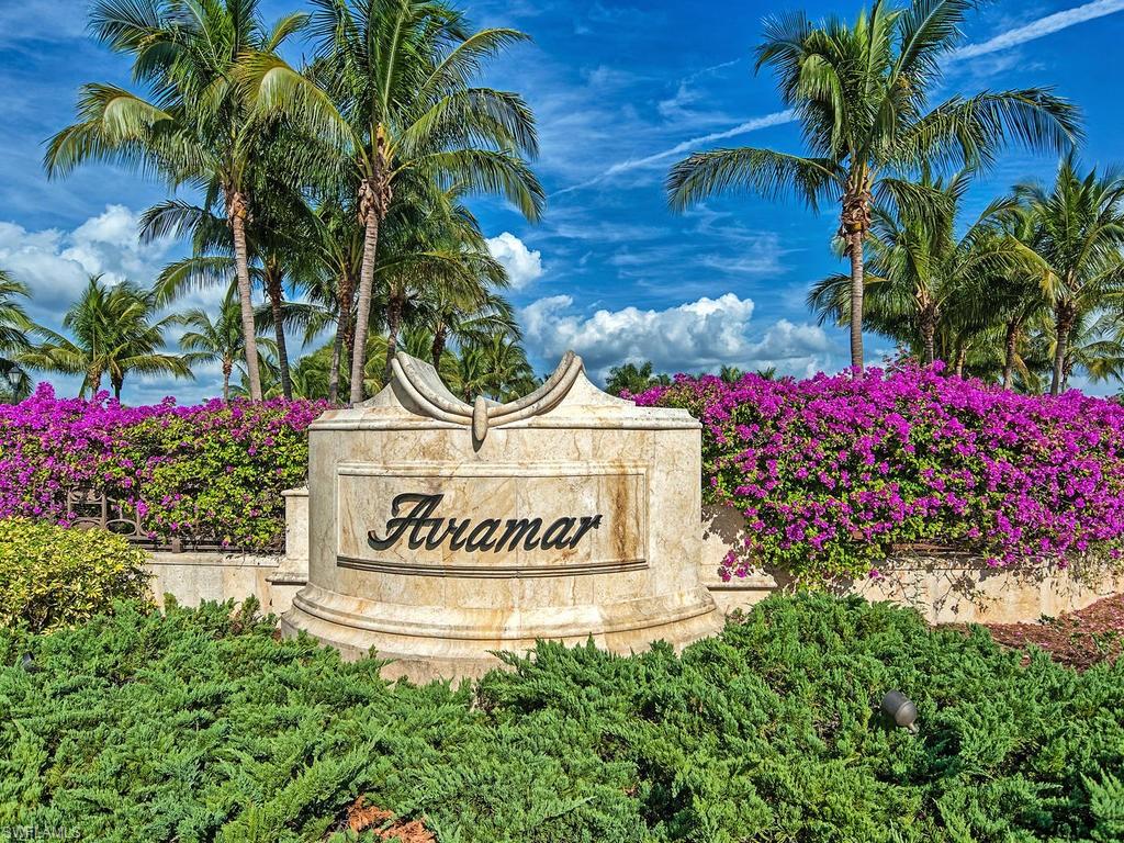 2850 Aviamar Circle Naples, FL 34114 - Photo 21 of 26 a sign that is sitting in front of flowers