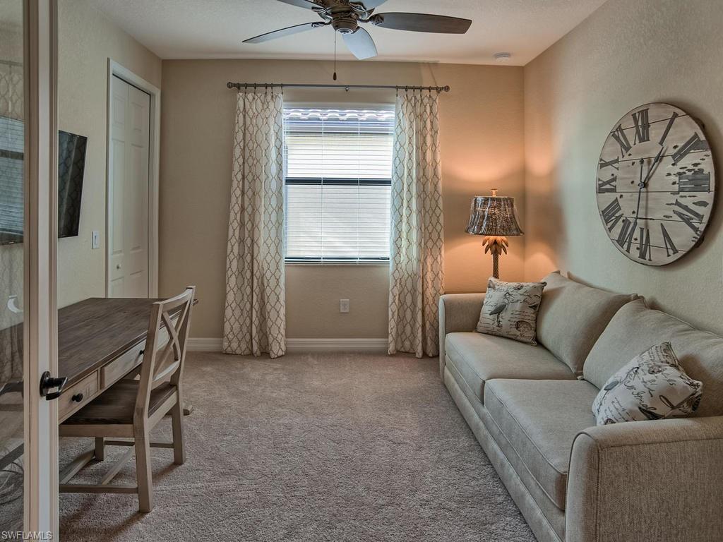 2850 Aviamar Circle Naples, FL 34114 - Photo 10 of 26 a living room with furniture and a window