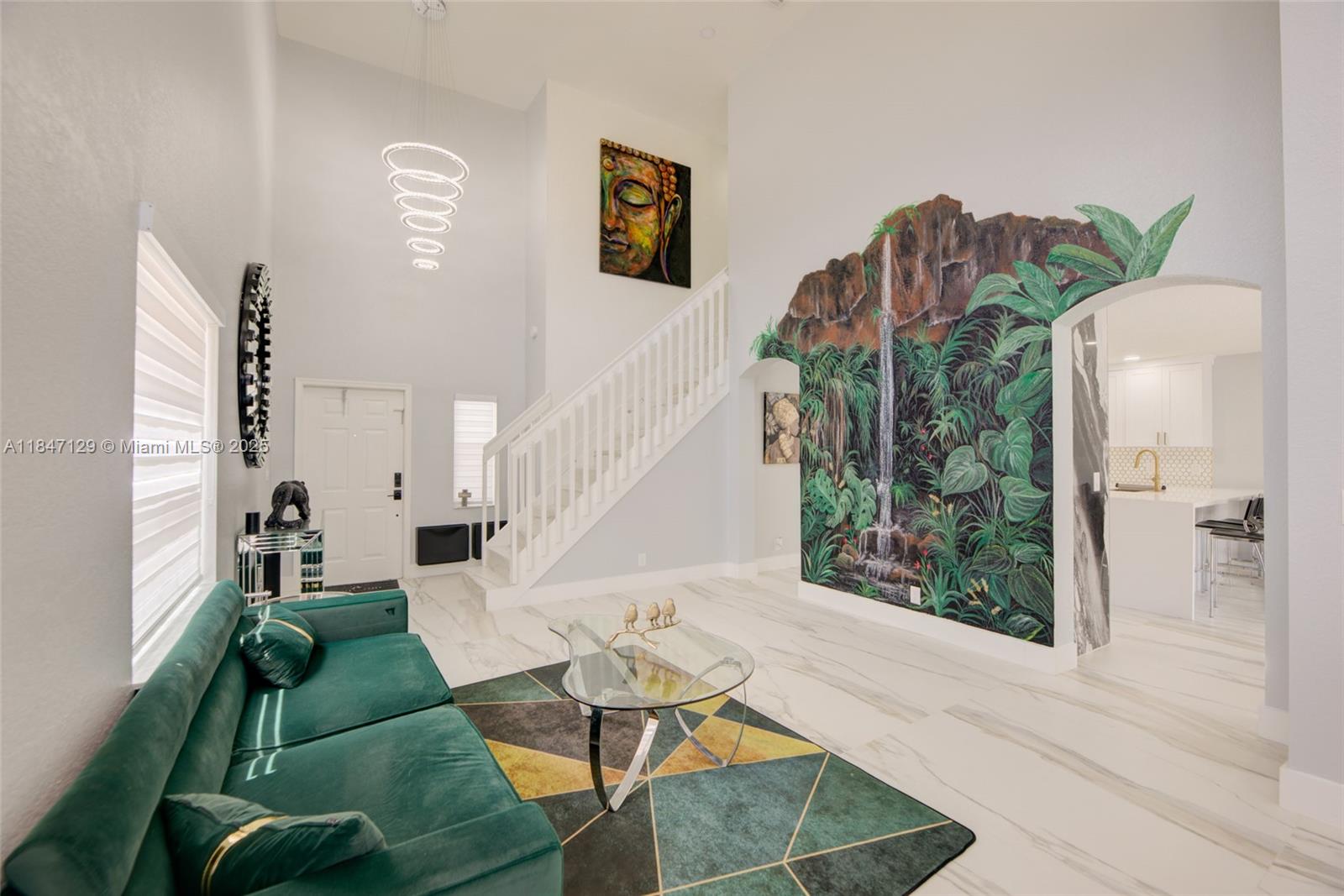 6073 Spring Isles Boulevard Lake Worth, FL 33463 - Photo 14 of 51 a living room with furniture and a floor to ceiling window
