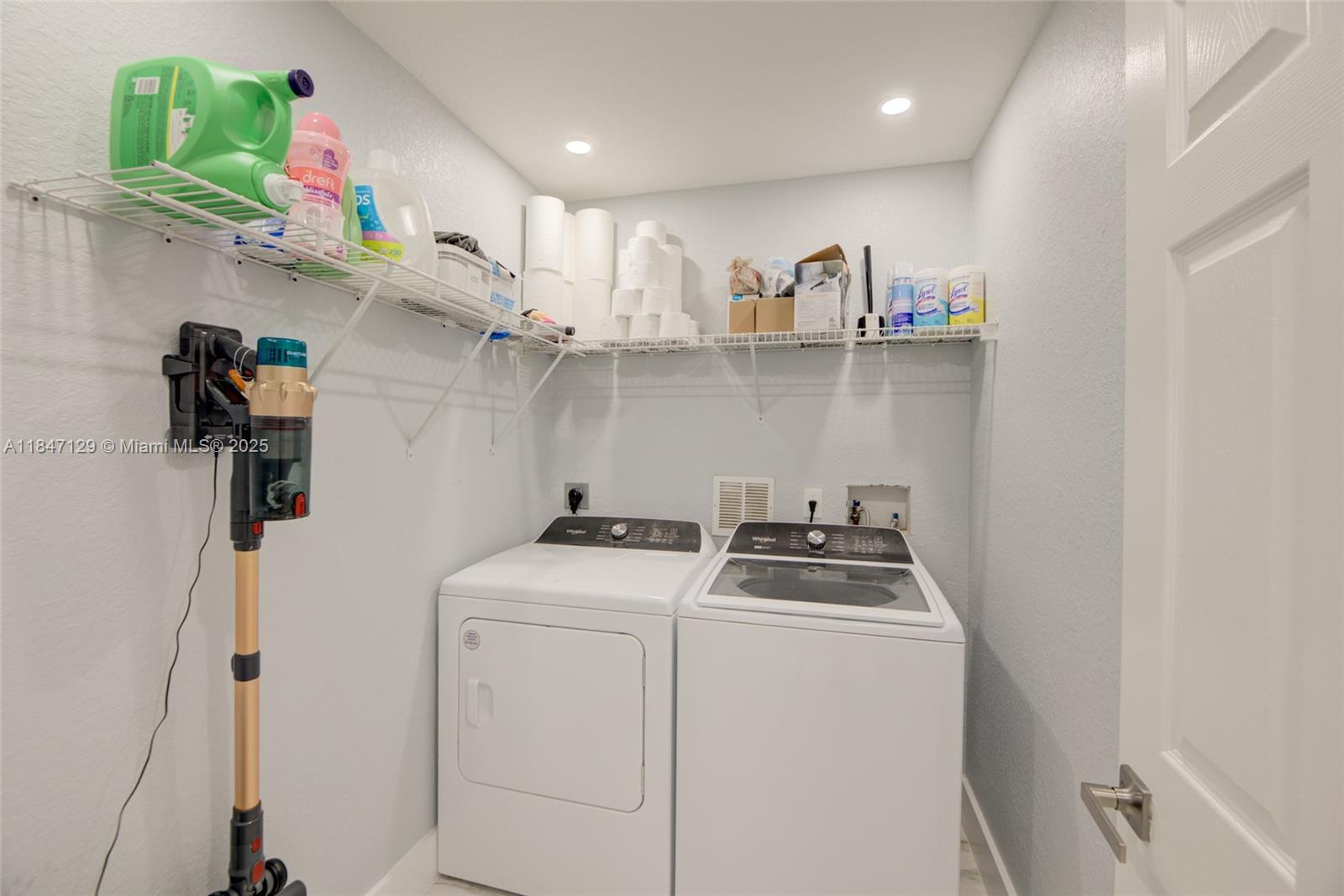 6073 Spring Isles Boulevard Lake Worth, FL 33463 - Photo 26 of 51 a room with storage and utility