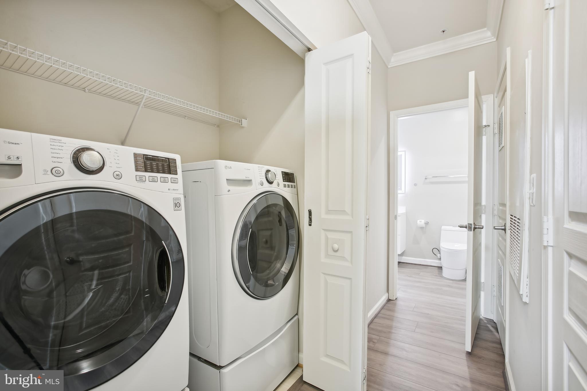 12000 Market Street, Unit 281 Reston, VA 20190 - Photo 28 of 50 Full-size washer and dryer in unit