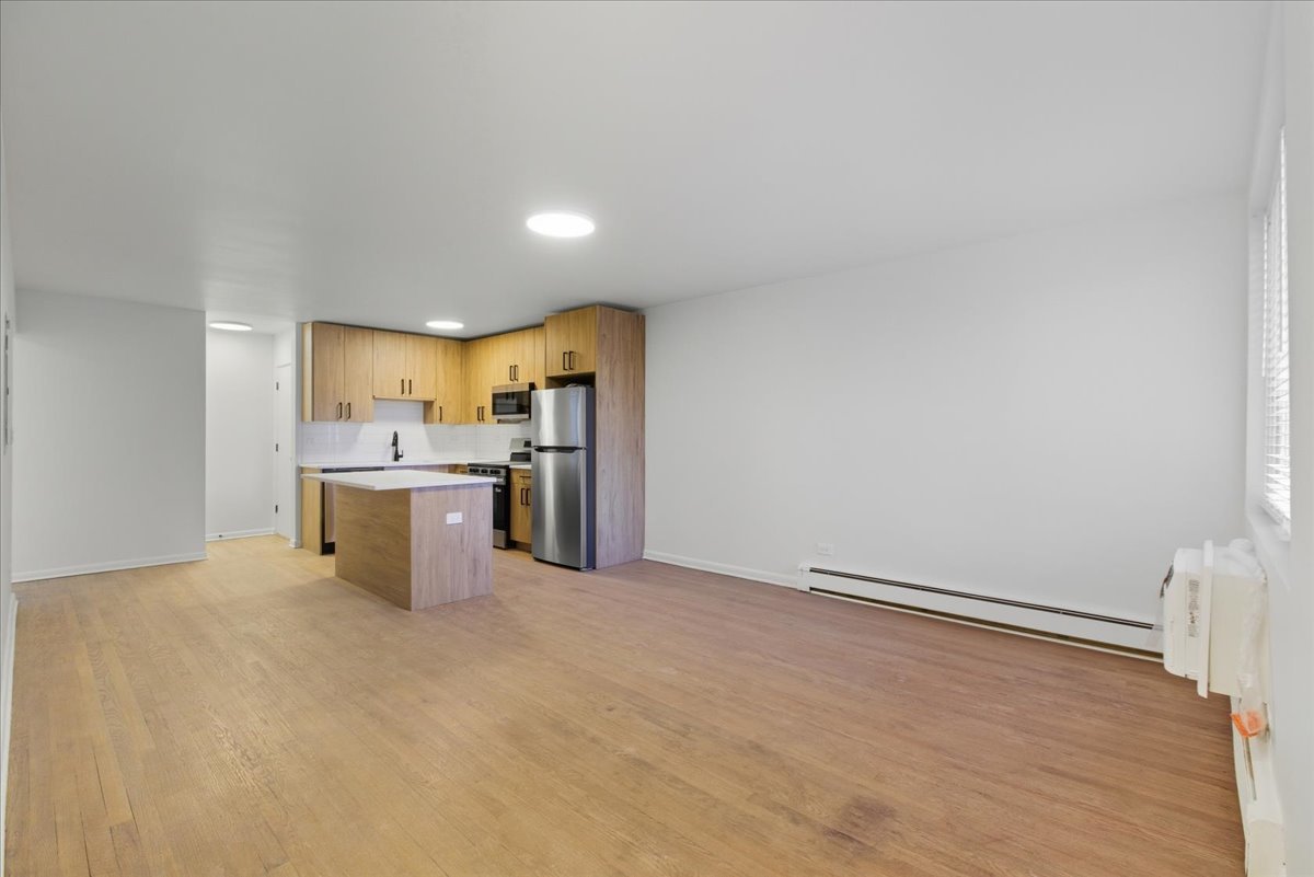 7357 North Winchester Avenue, Unit 2R Chicago, IL 60626 - Photo 3 of 10 a view of a kitchen with a sink