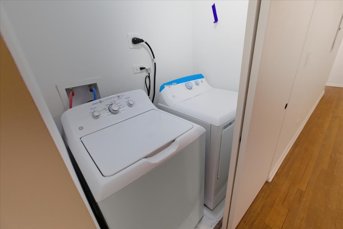 7357 North Winchester Avenue, Unit 2R Chicago, IL 60626 - Photo 10 of 10 a utility room with dryer and washer