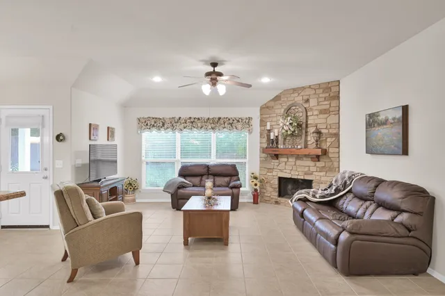 a room with furniture and a chandelier