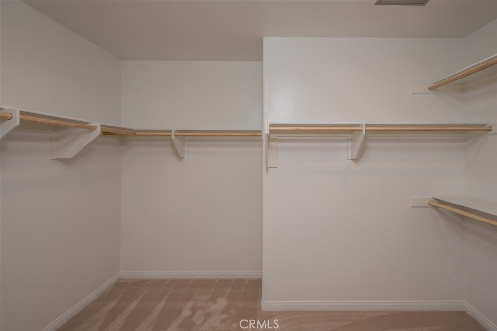 158 Spectacle Irvine, CA 92618 - Photo 5 of 19 a view of an empty walk in closet