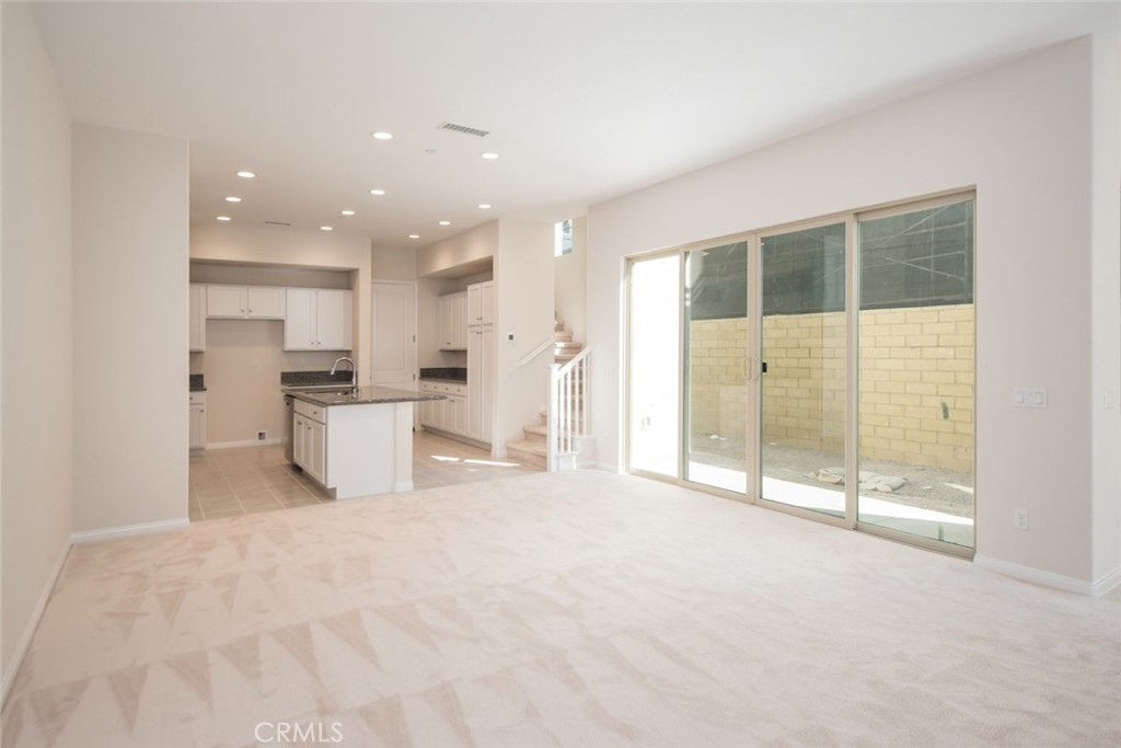 158 Spectacle Irvine, CA 92618 - Photo 8 of 19 a view of a kitchen with large windows