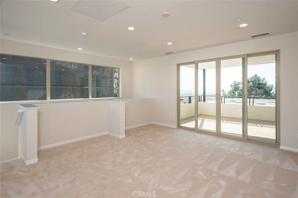 158 Spectacle Irvine, CA 92618 - Photo 9 of 19 a view of an empty room with a window