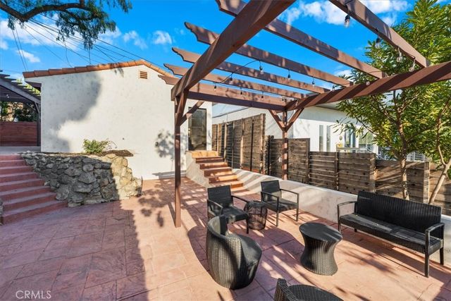 a outdoor space with patio lots of furniture and garden