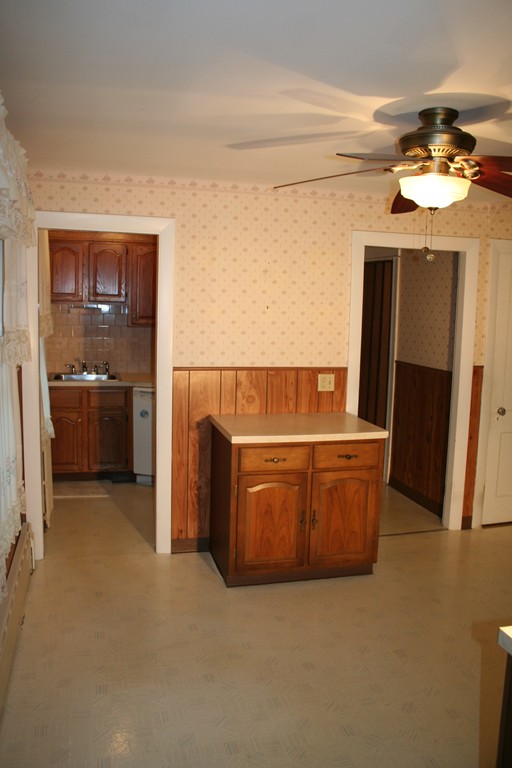 1 Coventry Road Worcester, MA 01606 - Photo 4 of 22 a room with table and chairs