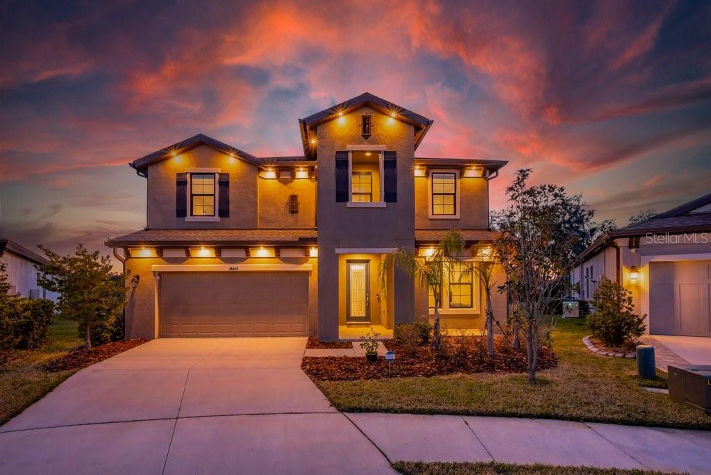 14604 Horse Trot Road Lithia, FL 33547 - Photo 1 of 62 a front view of a house with yard