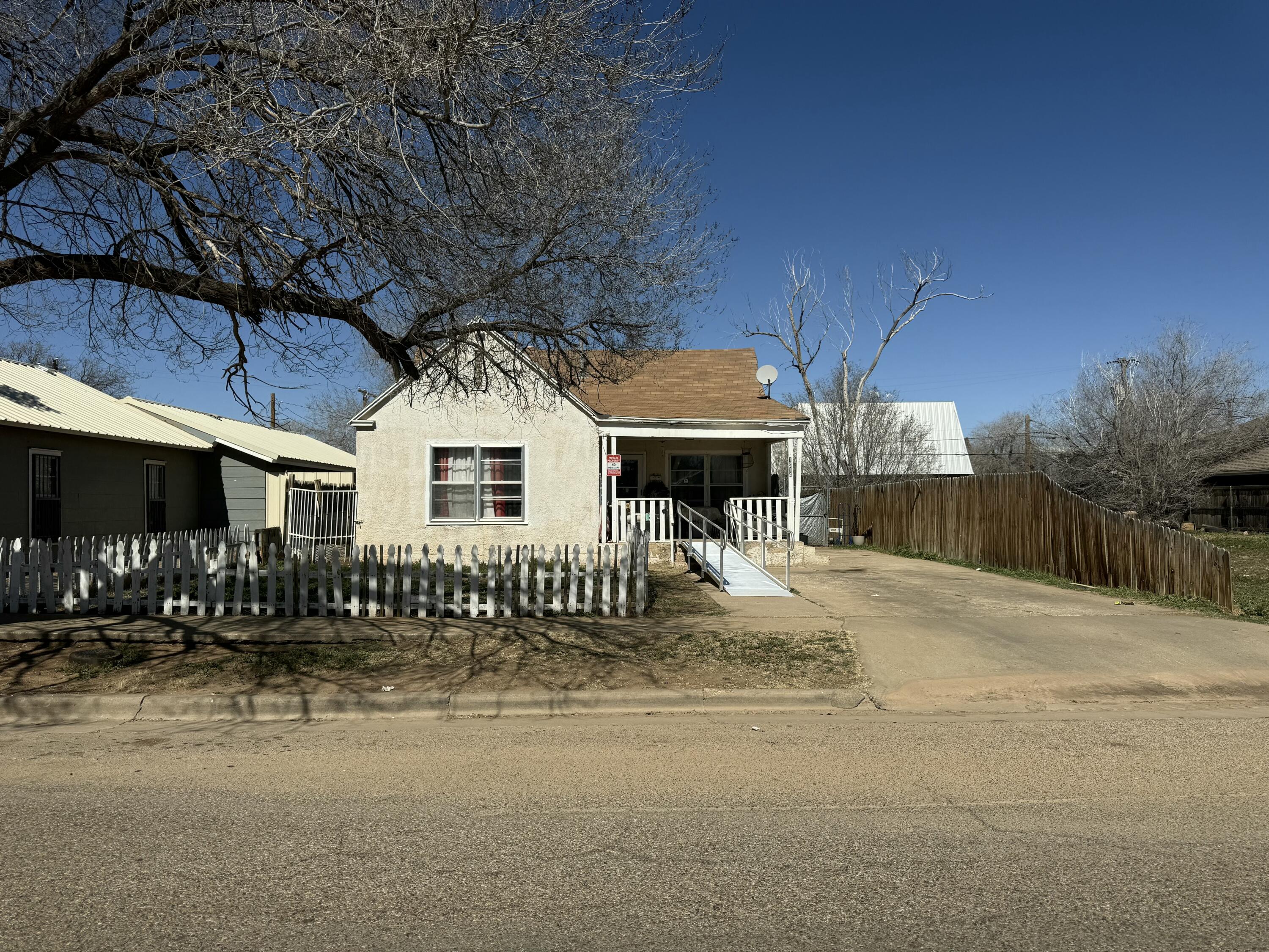 a front view of a house with a outdoor space