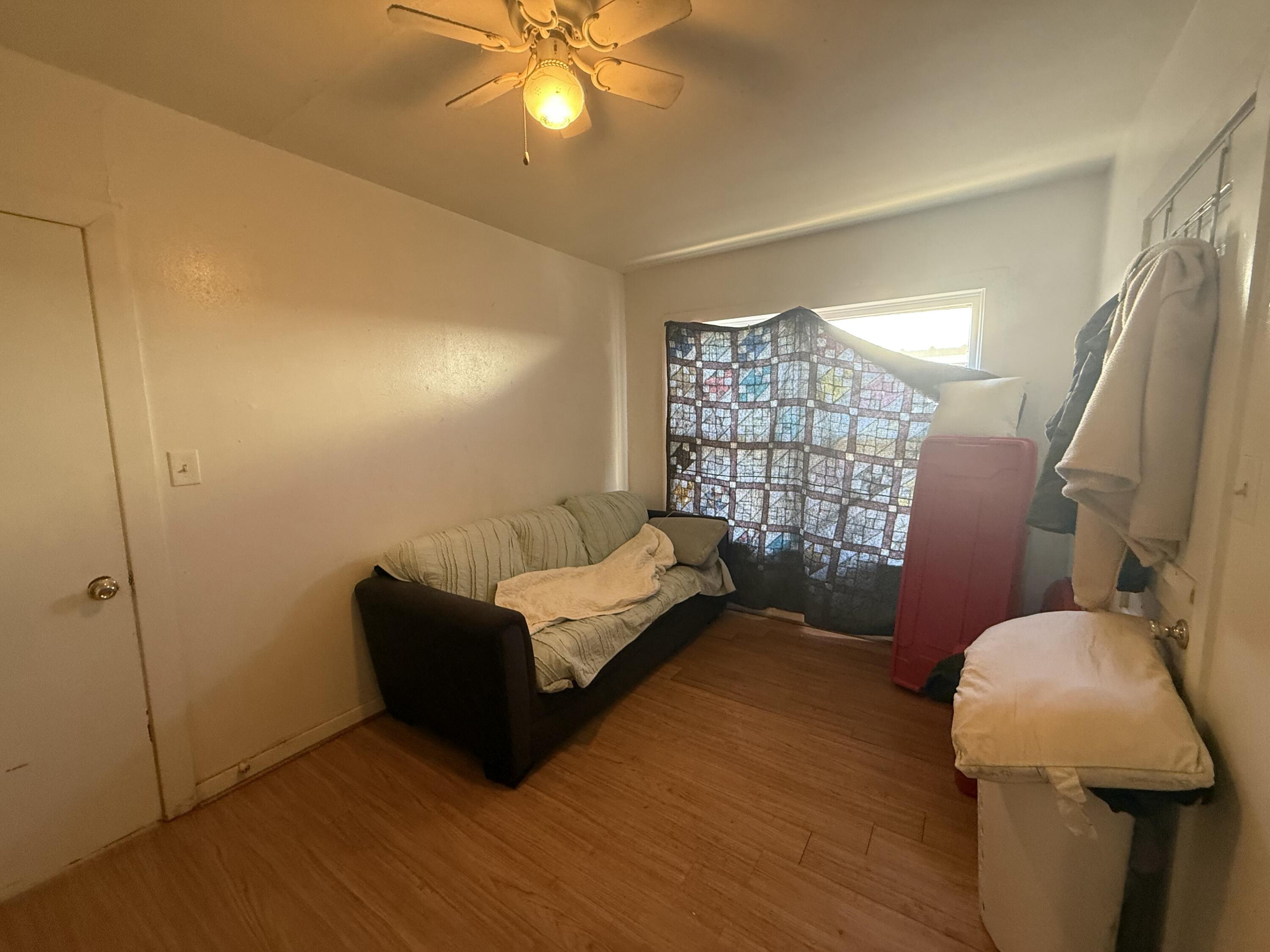 Package Package Property Lubbock, TX 79411 - Photo 15 of 107 a living room with furniture and a flat screen tv