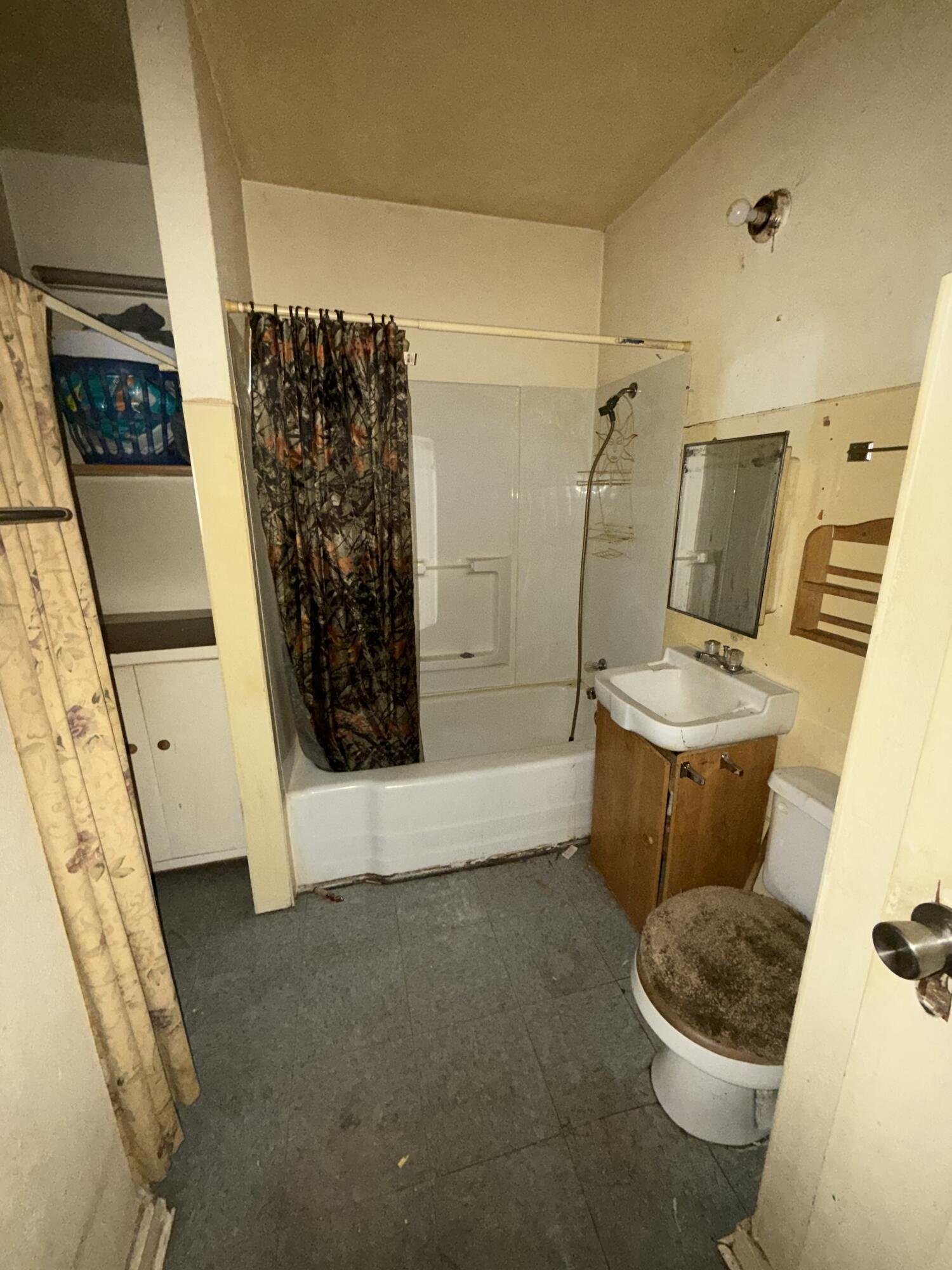 Package Package Property Lubbock, TX 79411 - Photo 62 of 107 a bathroom with a sink toilet and shower
