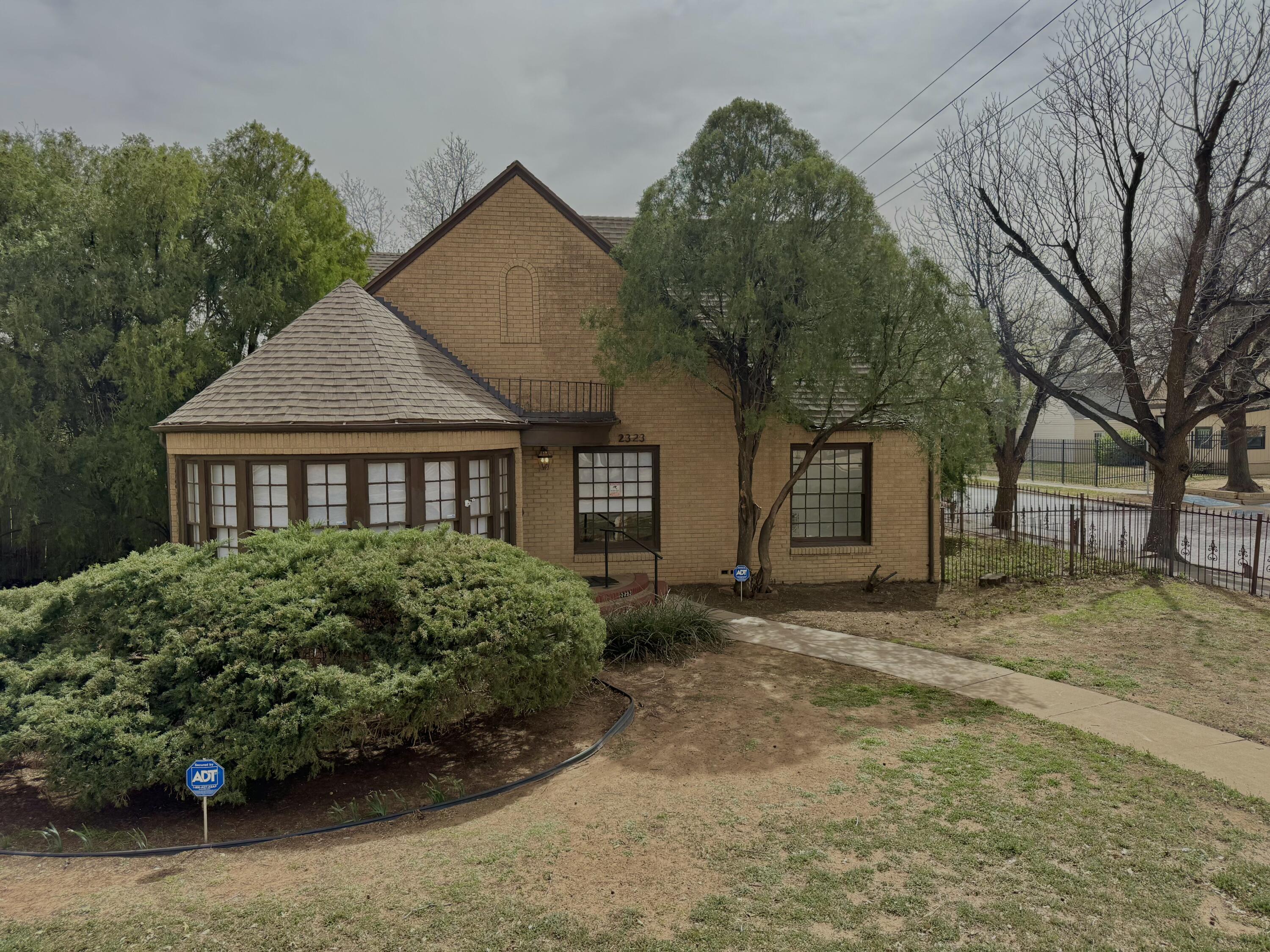 Package Package Property Lubbock, TX 79411 - Photo 72 of 107 a front view of a house with garden