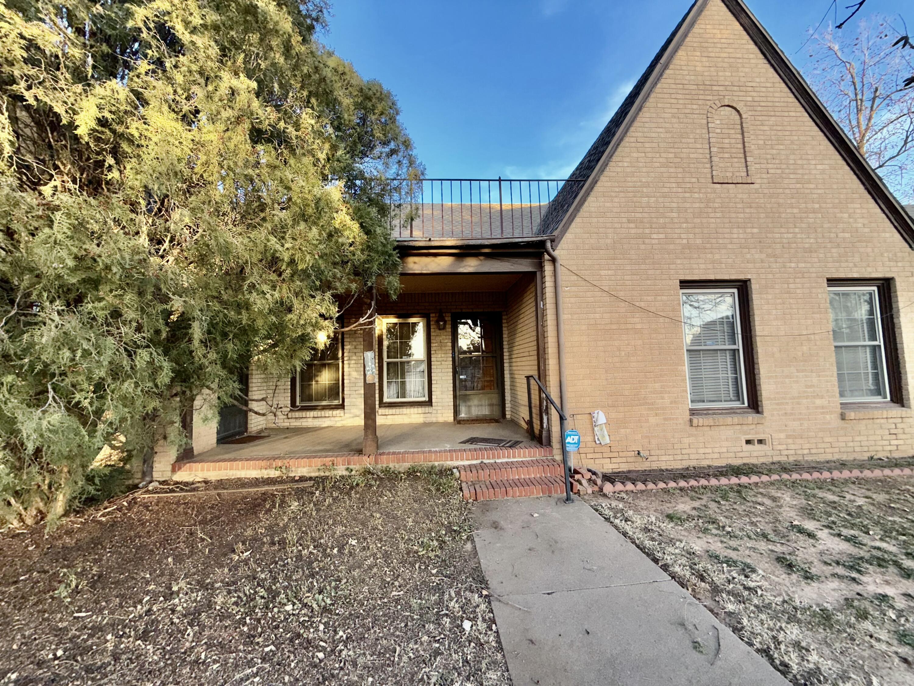 Package Package Property Lubbock, TX 79411 - Photo 76 of 107 a front view of a house with a yard
