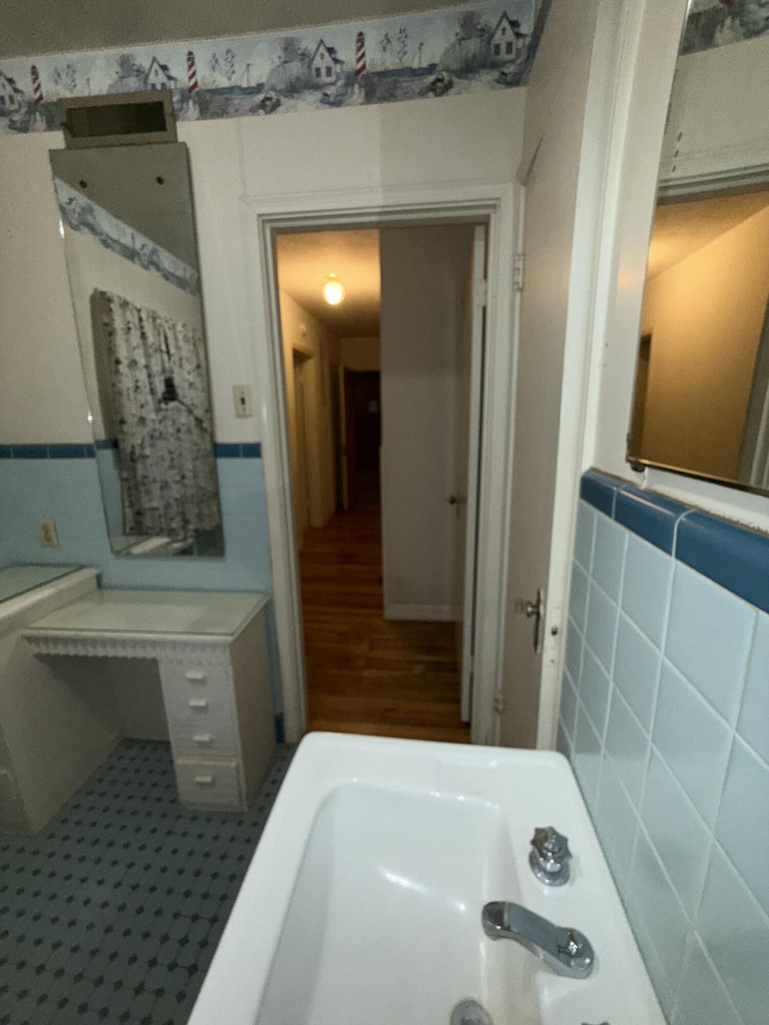 Package Package Property Lubbock, TX 79411 - Photo 88 of 107 a bathroom with a sink and a mirror