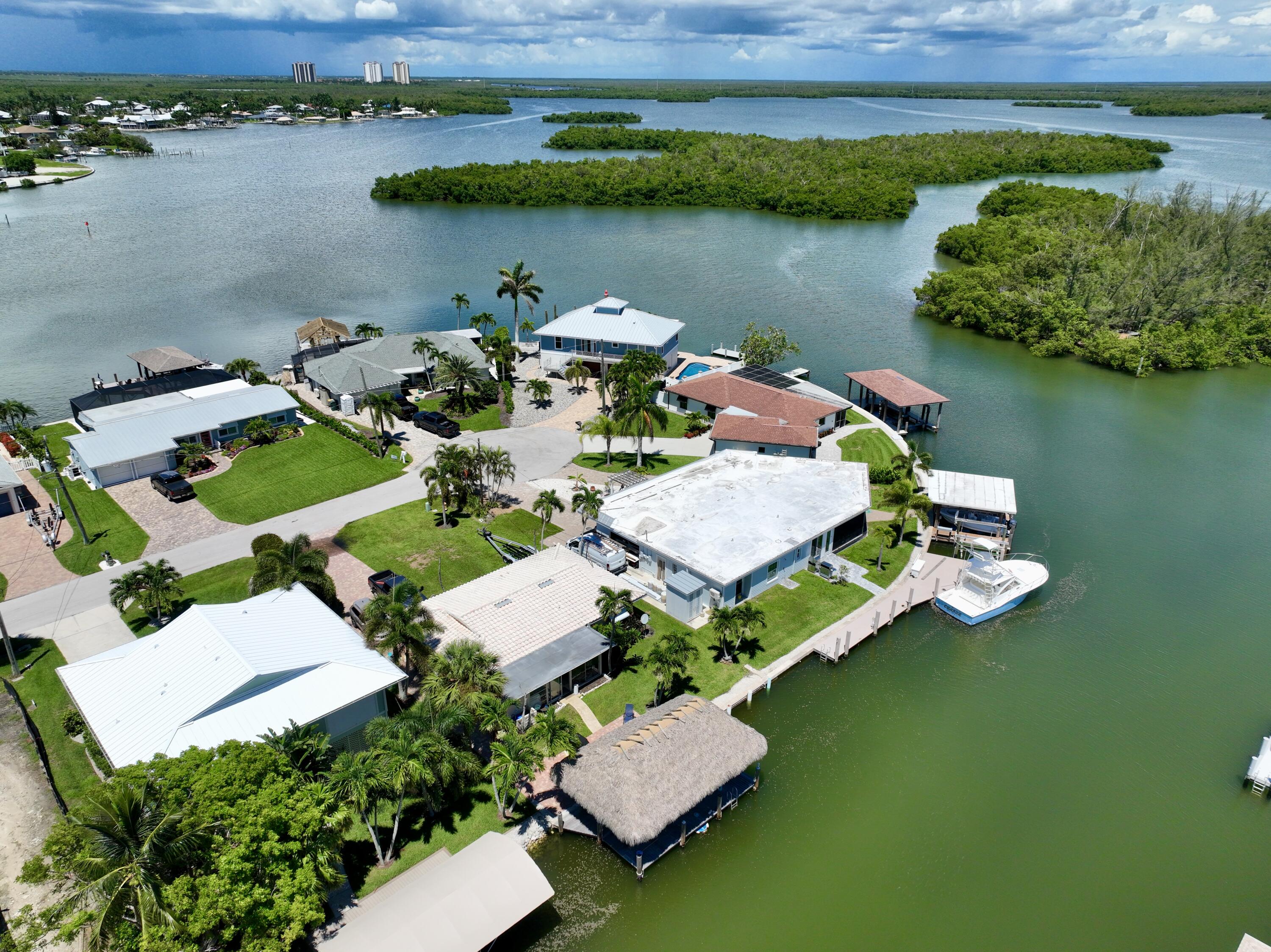 164 East Hilo Street Naples, FL 34113 - Photo 25 of 32 dji_fly_20240618_202822_992_171925926092