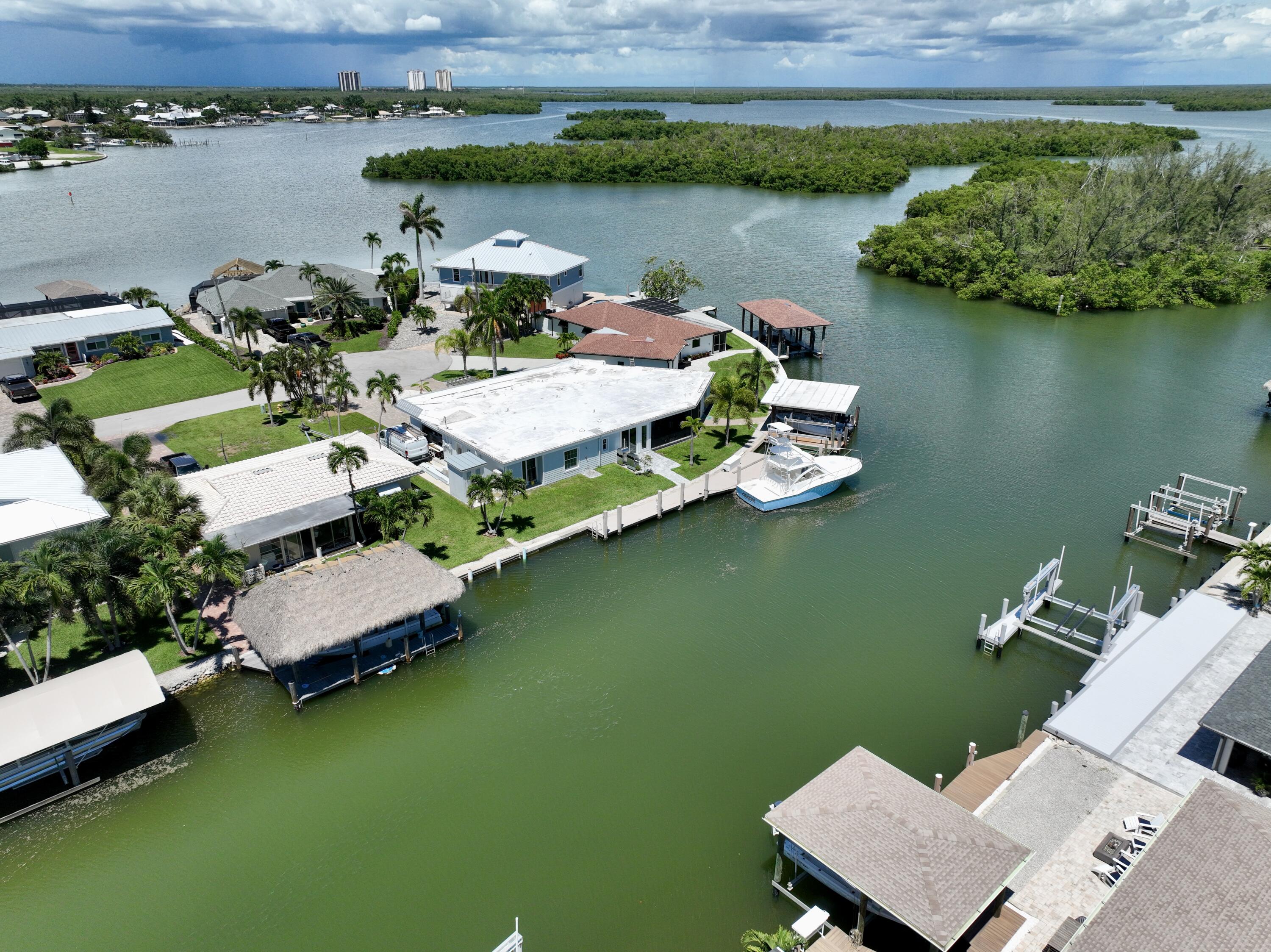 164 East Hilo Street Naples, FL 34113 - Photo 27 of 32 dji_fly_20240618_202744_989_171925926177