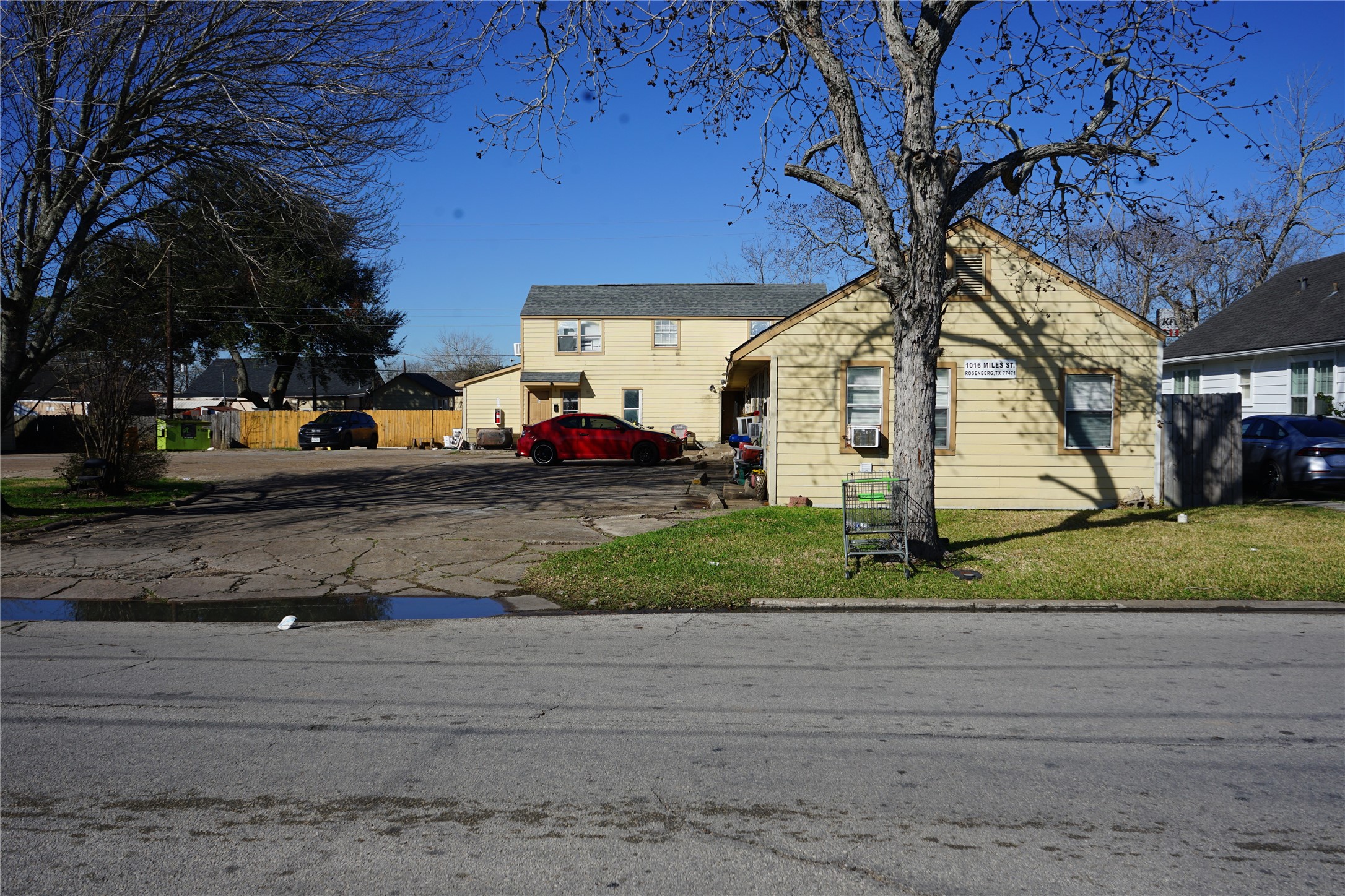 1026 Miles Street Rosenberg, TX 77471 - Photo 7 of 11 a view of a yard in front of a house