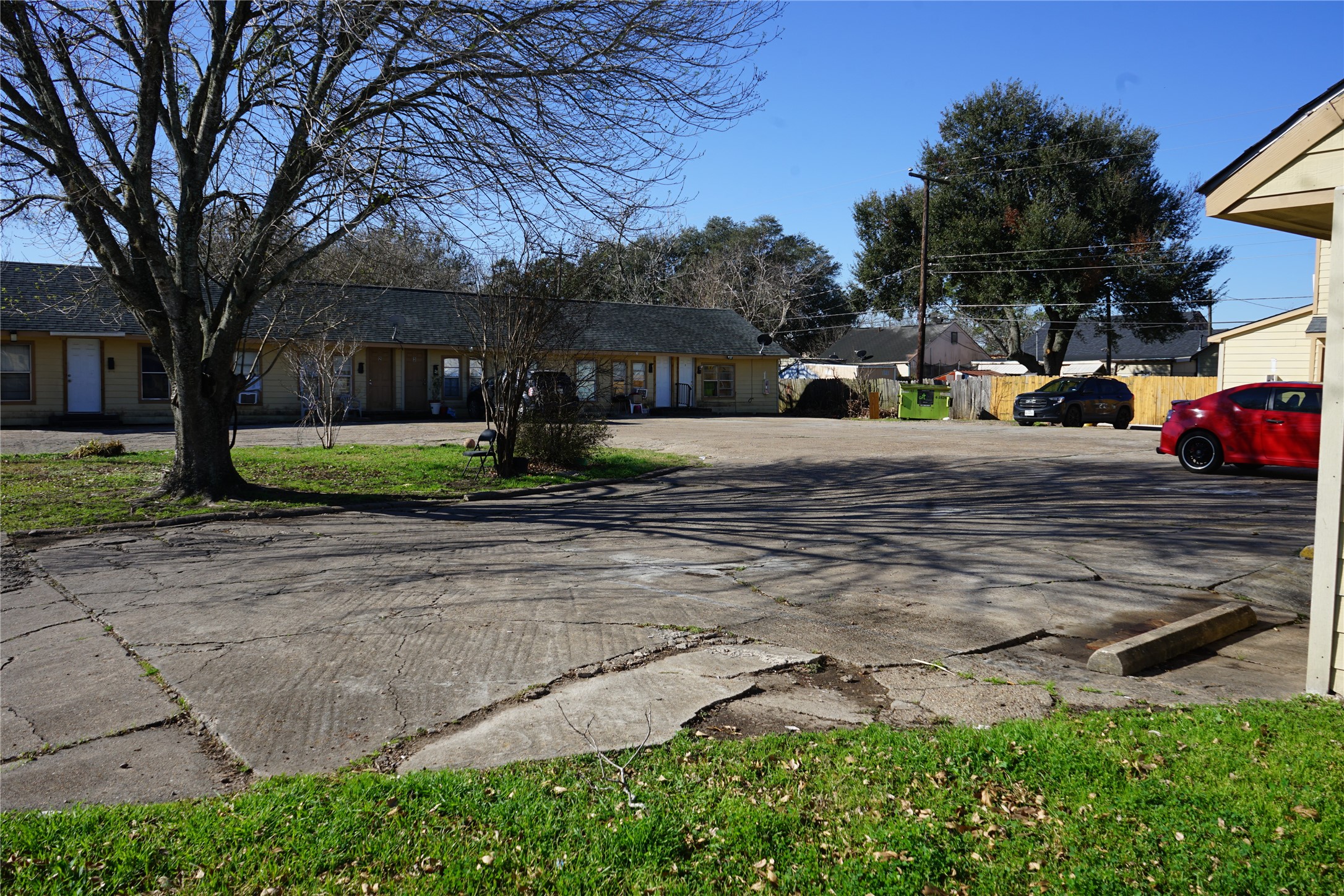 1026 Miles Street Rosenberg, TX 77471 - Photo 10 of 11 a view of a yard with cars