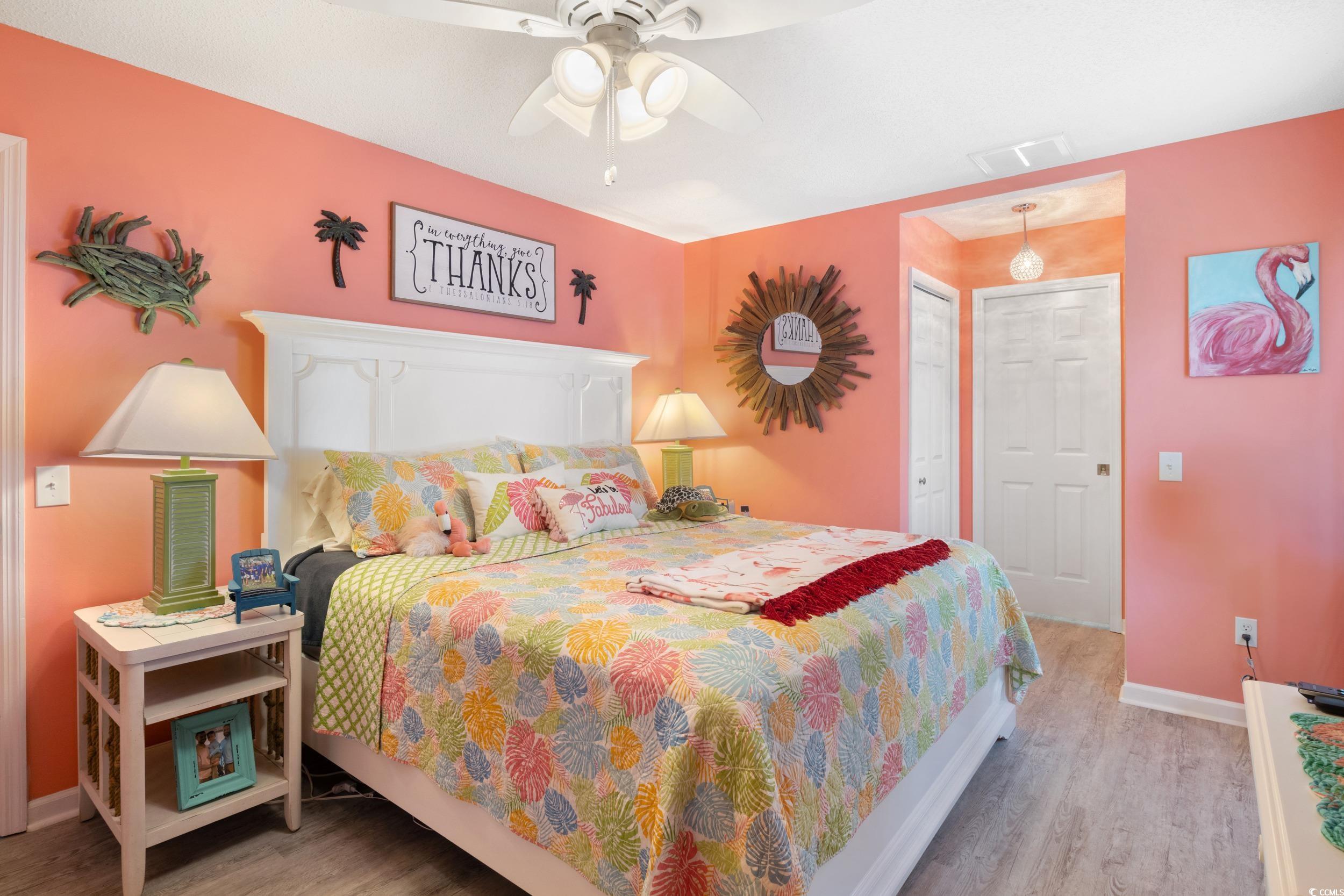919 Dock Place Murrells Inlet, SC 29576 - Photo 17 of 39 Bedroom with wood finished floors and a ceiling fan