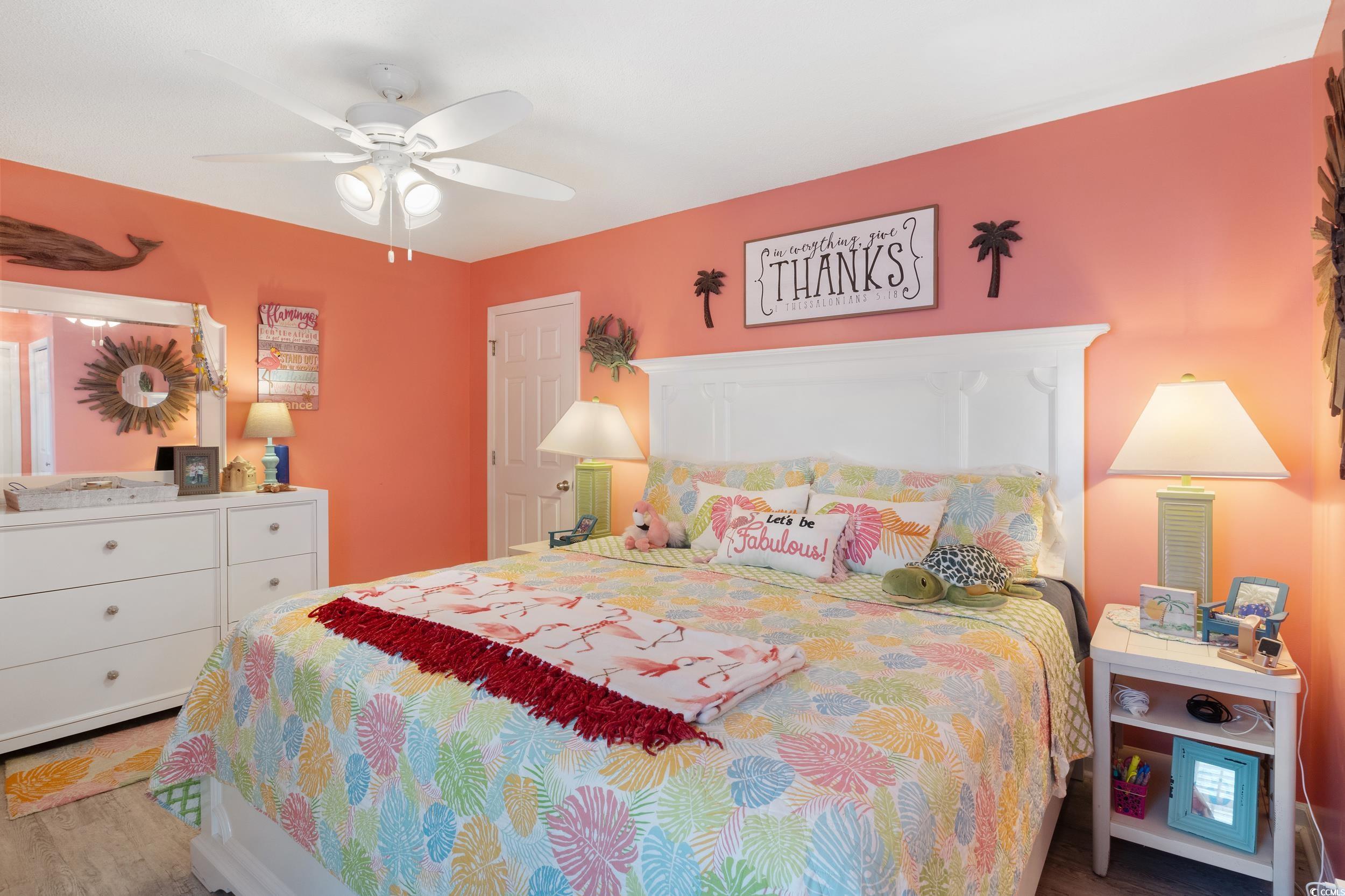 919 Dock Place Murrells Inlet, SC 29576 - Photo 18 of 39 Bedroom featuring wood finished floors and a ceiling fan