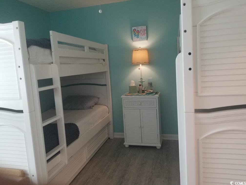 919 Dock Place Murrells Inlet, SC 29576 - Photo 23 of 39 Bedroom with wood finished floors and baseboards