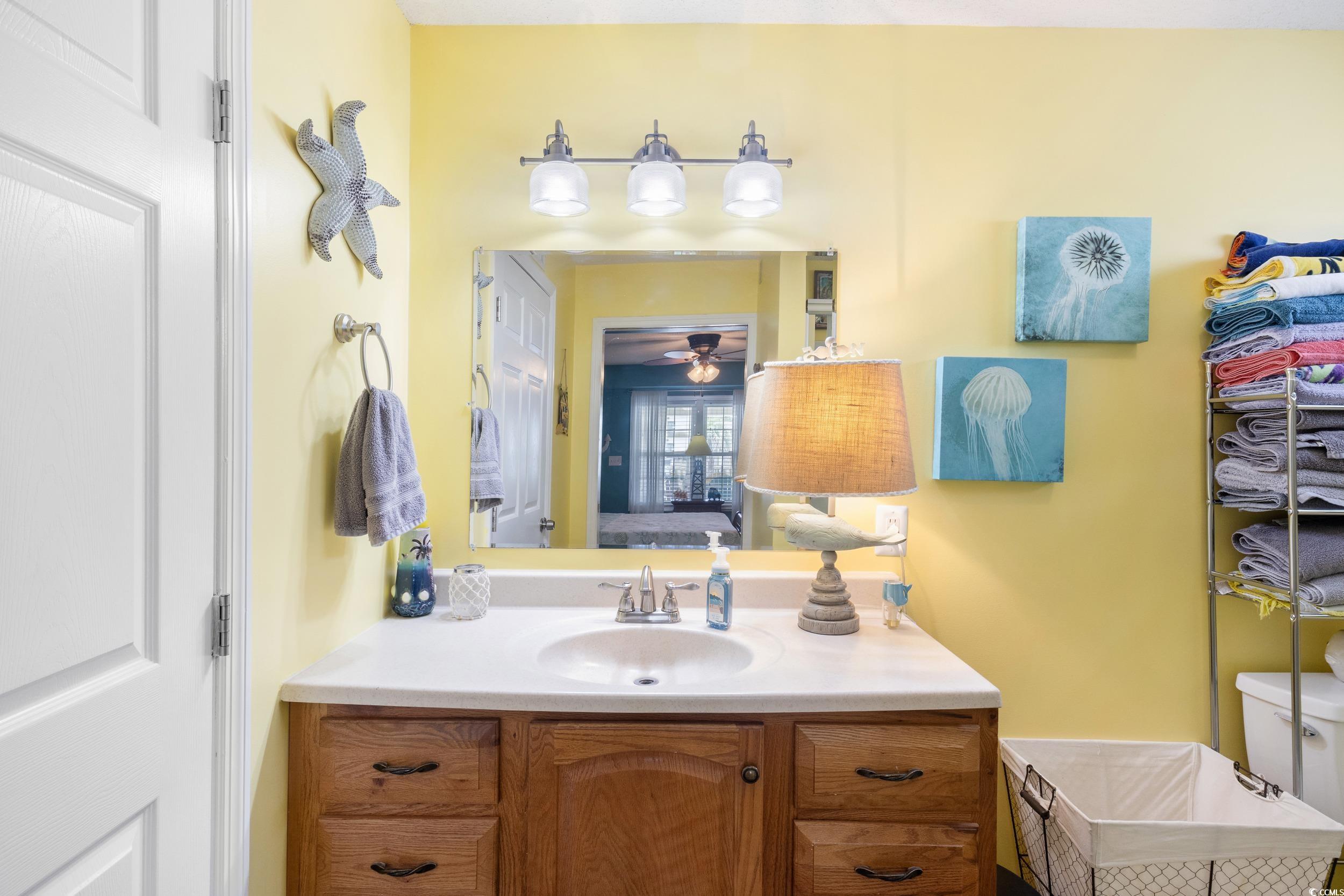 919 Dock Place Murrells Inlet, SC 29576 - Photo 34 of 39 Bathroom with vanity and ceiling fan
