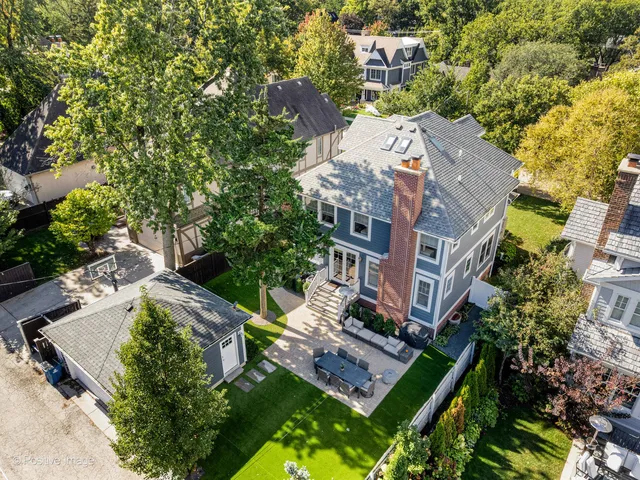 an aerial view of a house with a garden