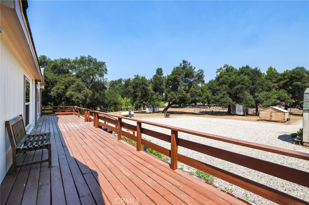 10880 Fox Springs Road Fallbrook, CA 92028 - Photo 3 of 39 a view of balcony with wooden floor and seating space
