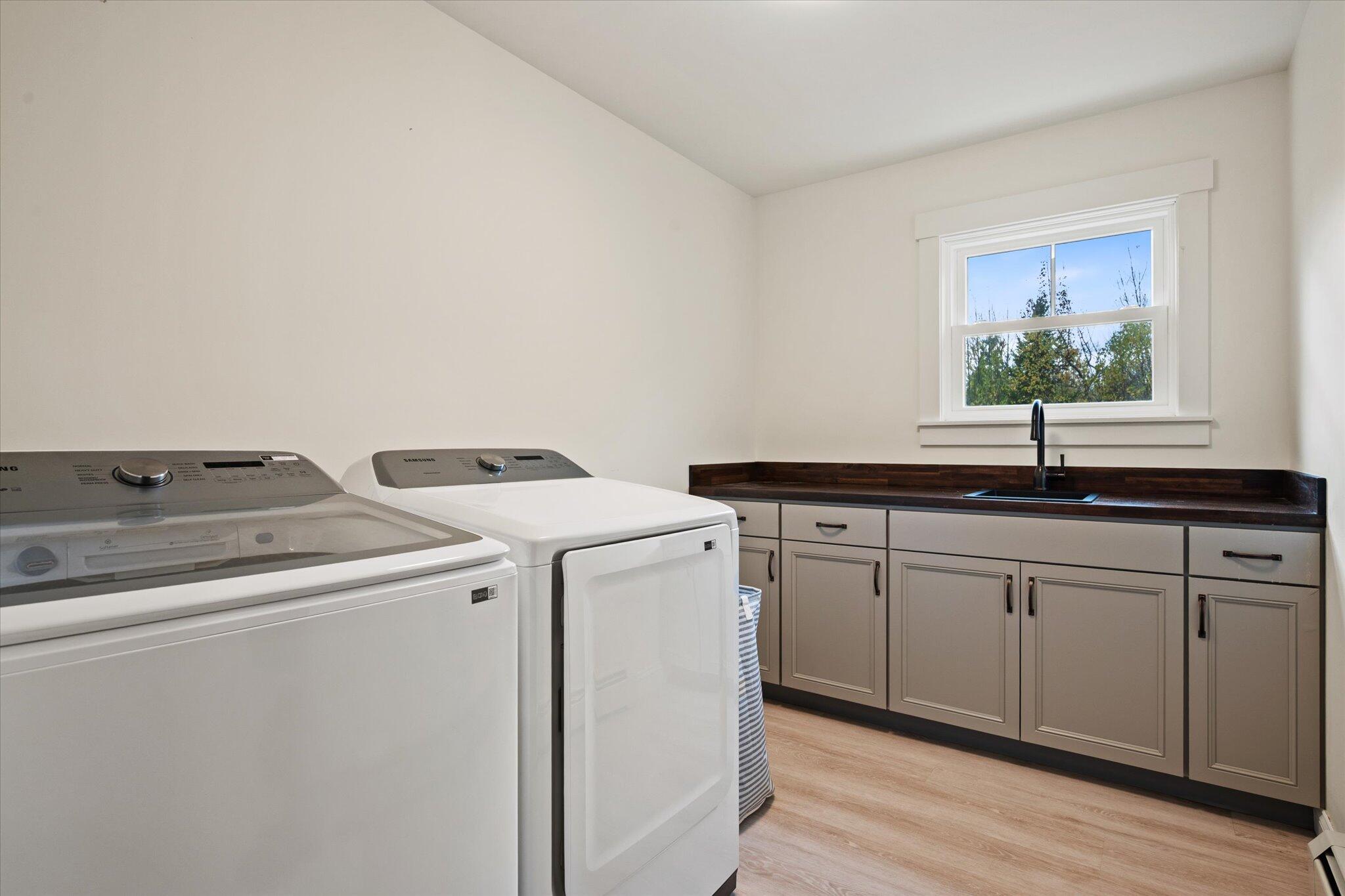 365 Walden Parke Way Bangor, ME 04401 - Photo 38 of 59 Laundry-with sink and cabinetry