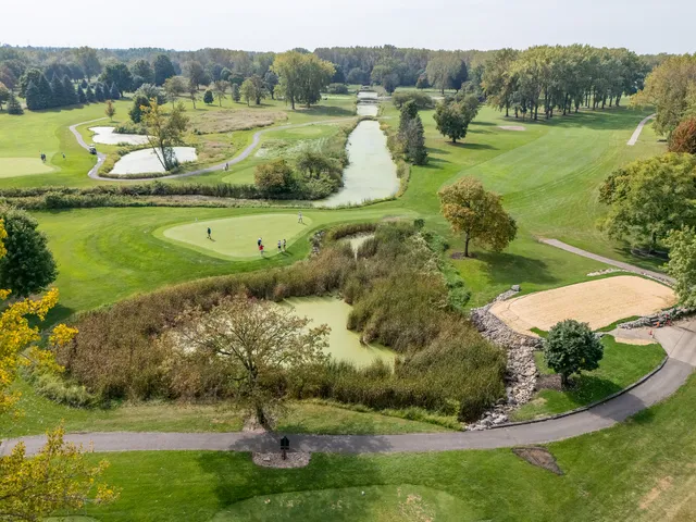 a picture of a bathroom with a sink and a large mirror