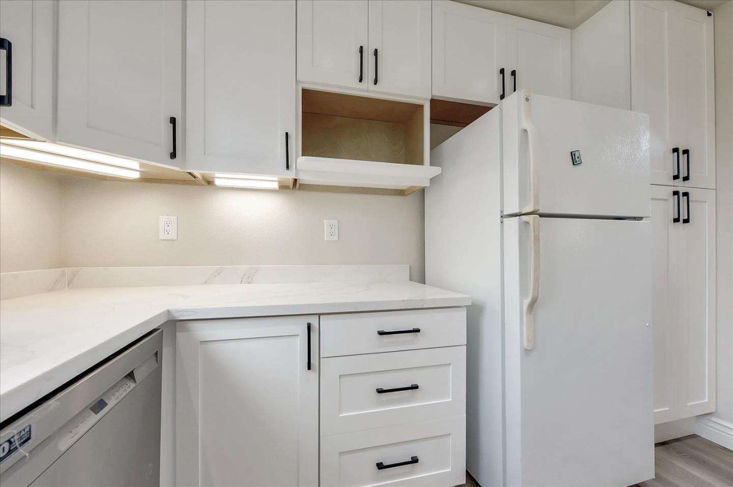 2276 Towne Circle Mountain View, CA 94040 - Photo 13 of 37 a white refrigerator freezer sitting inside of a kitchen