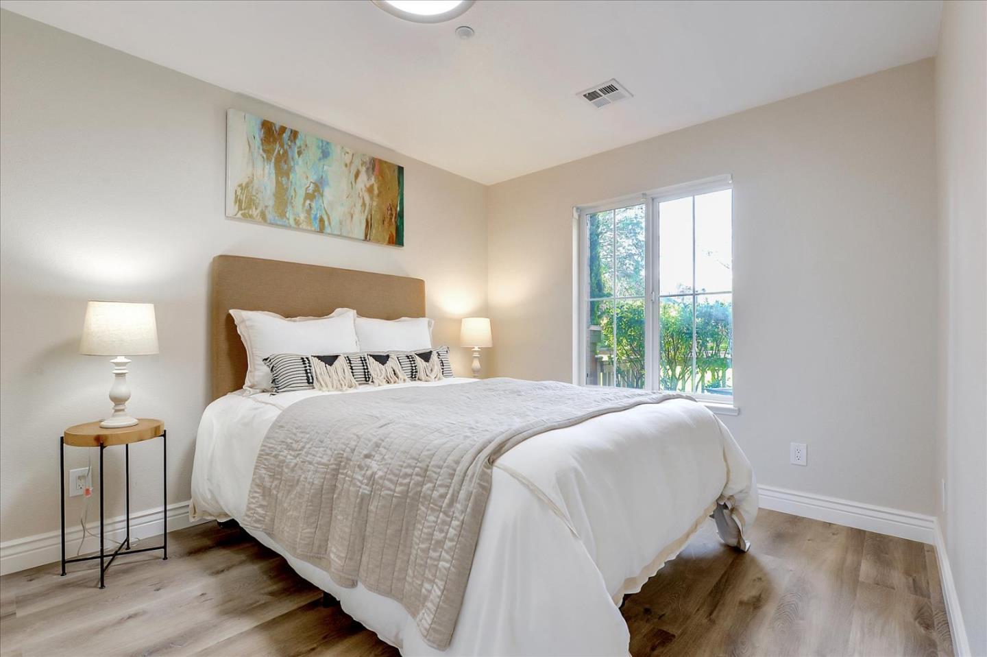 2276 Towne Circle Mountain View, CA 94040 - Photo 24 of 37 a bedroom with a bed and a night stand
