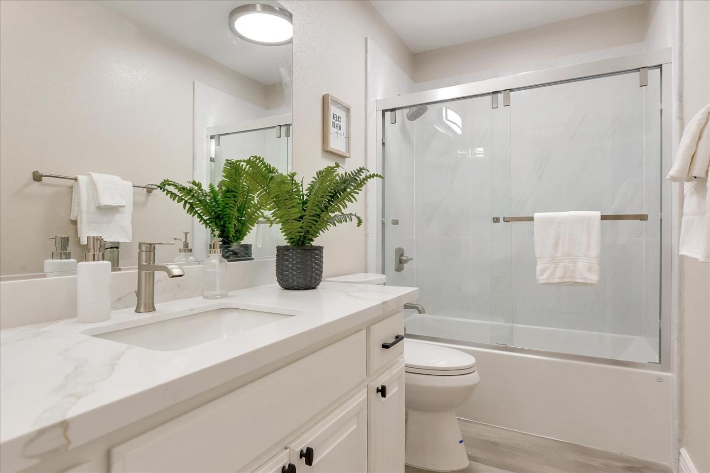 2276 Towne Circle Mountain View, CA 94040 - Photo 29 of 37 a bathroom with a sink a toilet and shower