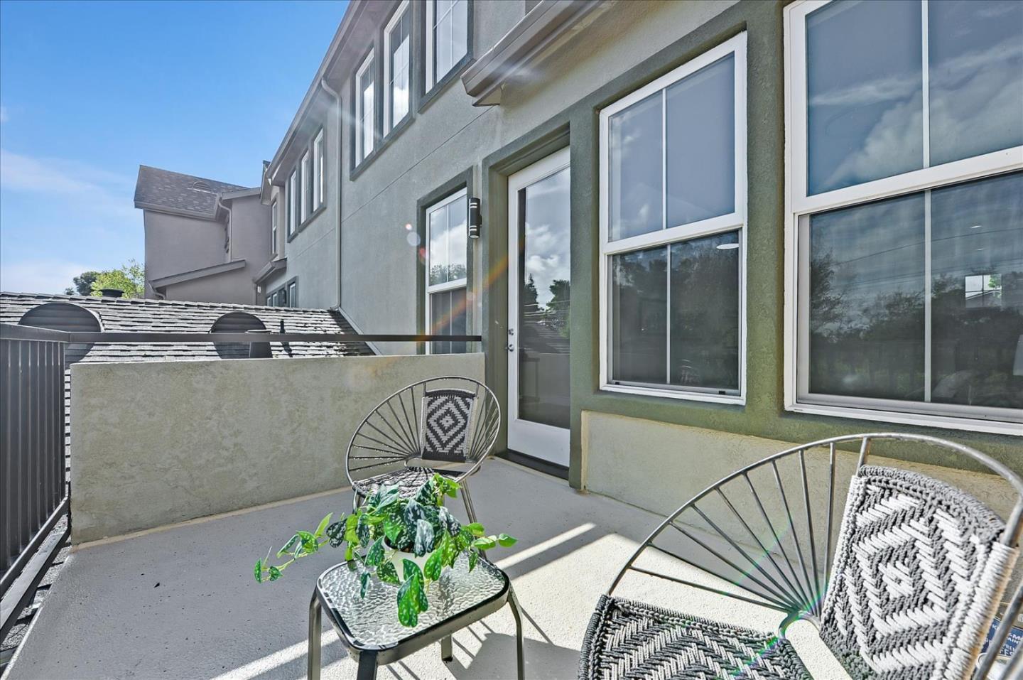 2276 Towne Circle Mountain View, CA 94040 - Photo 33 of 37 a front view of a house with outdoor seating and stairs
