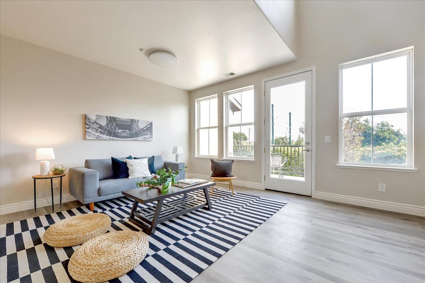 2276 Towne Circle Mountain View, CA 94040 - Photo 6 of 37 a living room with furniture and a large window