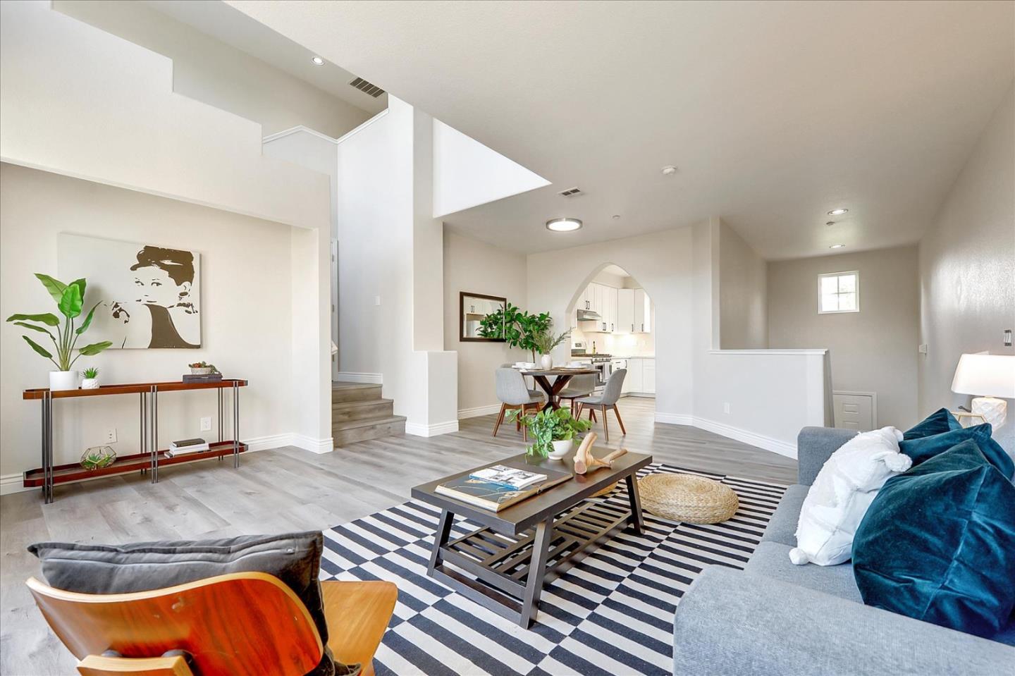 2276 Towne Circle Mountain View, CA 94040 - Photo 9 of 37 a living room with furniture and wooden floor