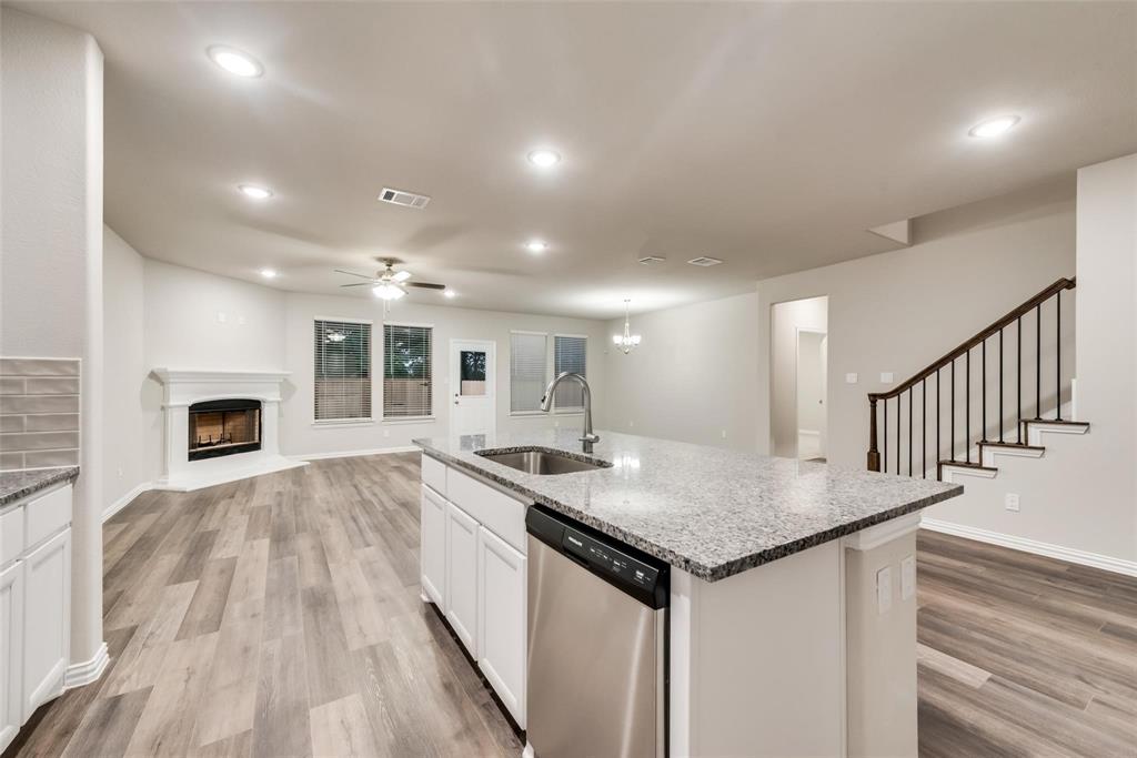 739 Copley Street Sherman, TX 75090 - Photo 31 of 31 a kitchen with sink and microwave
