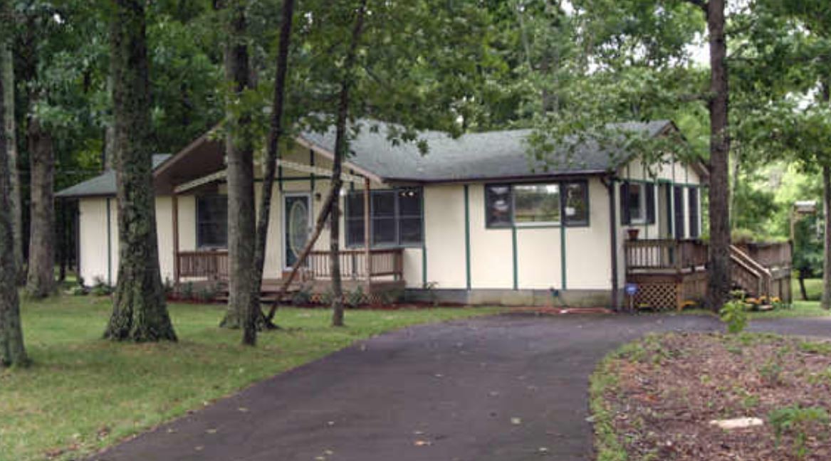 9718 Concord Road Rockvale, TN 37153 - Photo 1 of 1 a front view of a house with a garden
