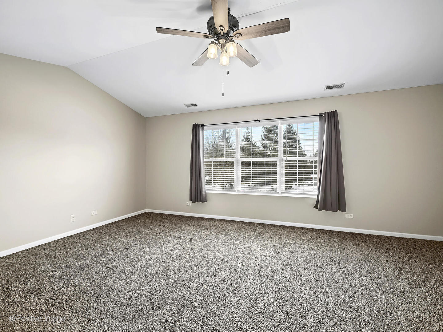 24126 Walnut Circle Plainfield, IL 60585 - Photo 9 of 17 a view of an empty room with a window