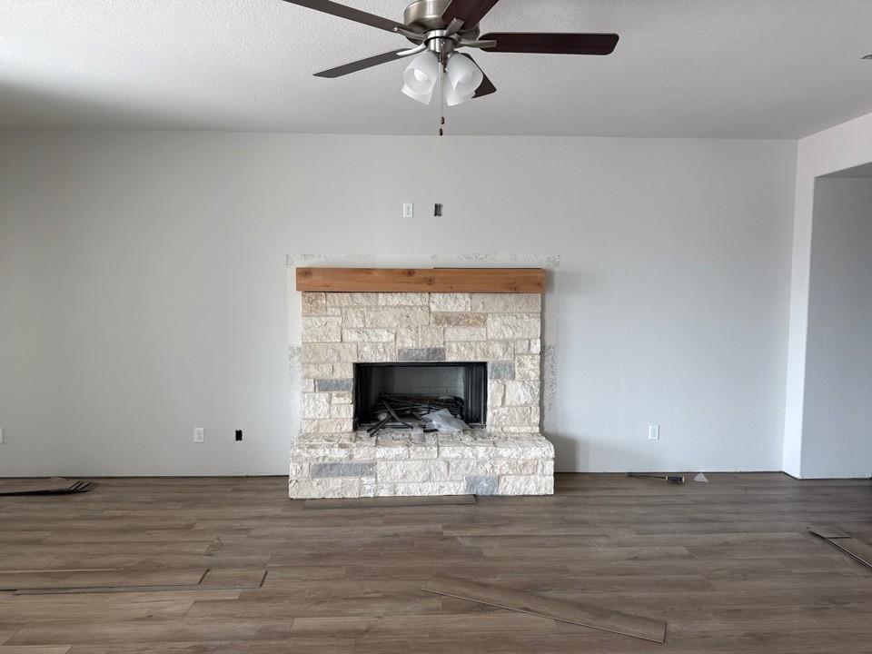1333 Frio Drive Springtown, TX 76082 - Photo 3 of 7 a living room with a fireplace