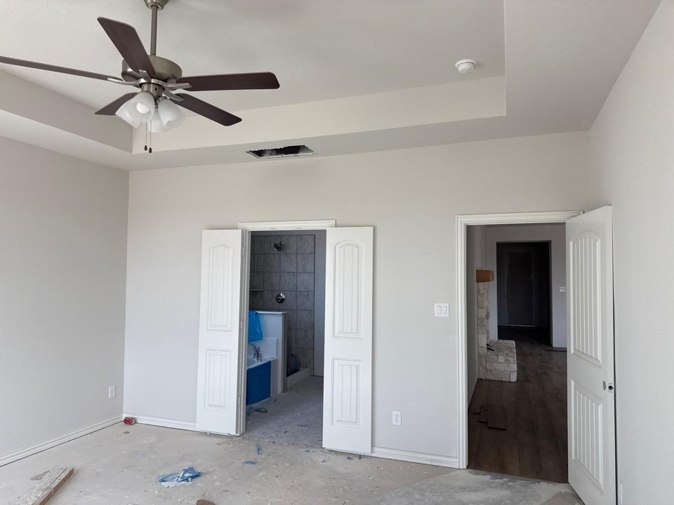 1333 Frio Drive Springtown, TX 76082 - Photo 5 of 7 a view of an empty room with a ceiling fan