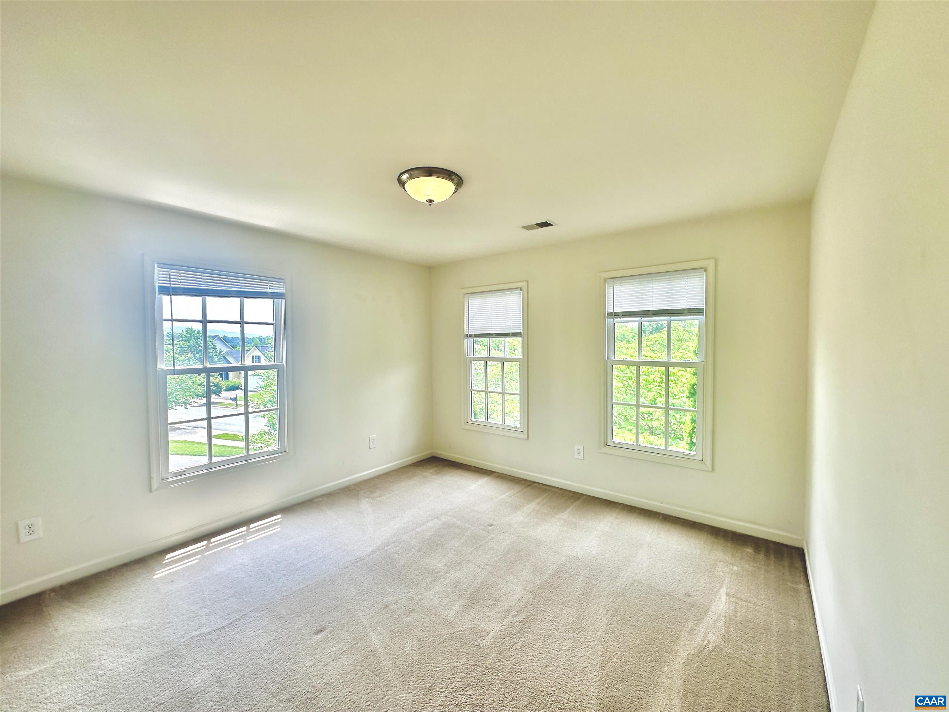 252 Millstream Drive Crozet, VA 22932 - Photo 20 of 41 a view of an empty room with a window
