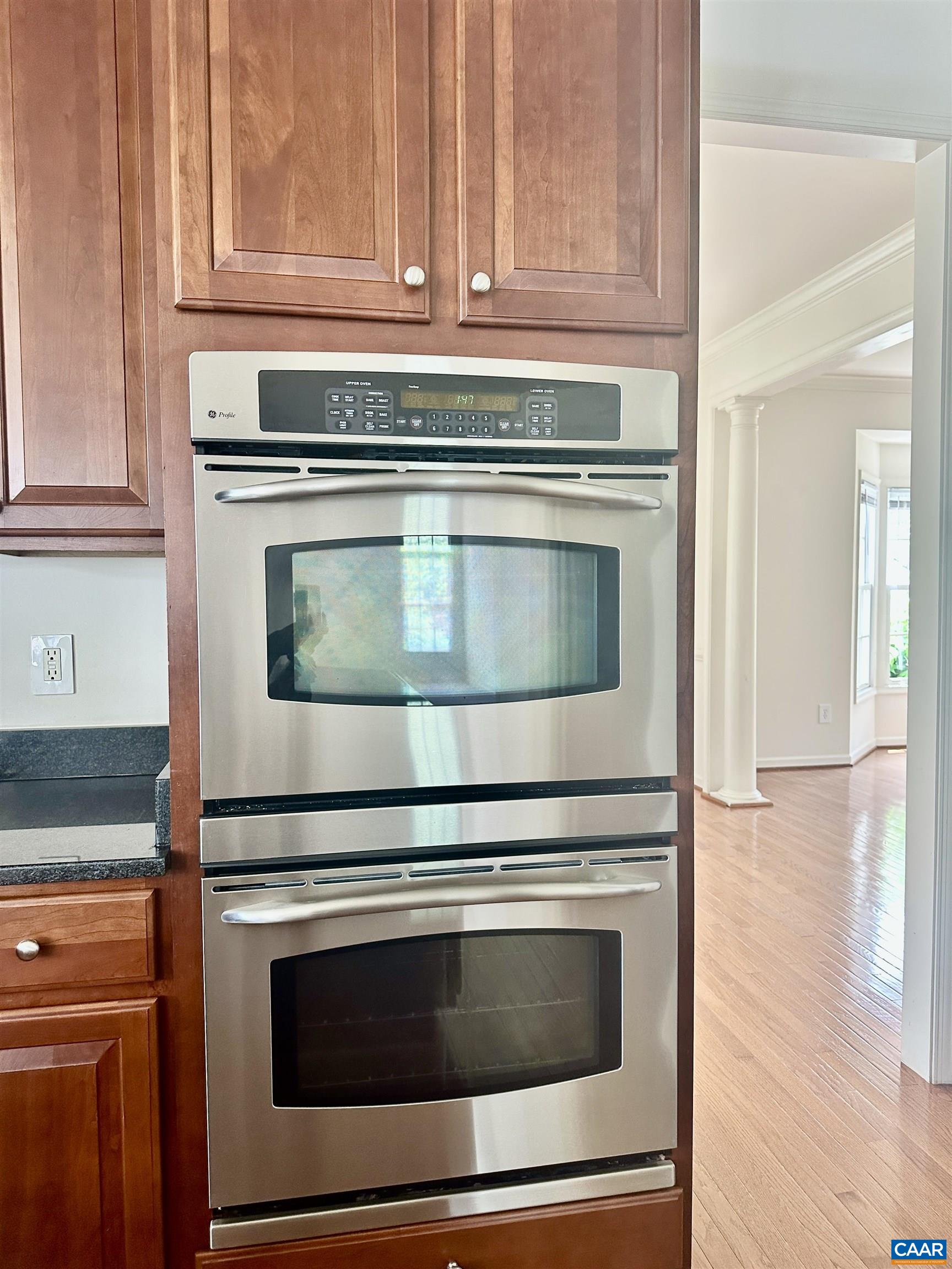 252 Millstream Drive Crozet, VA 22932 - Photo 28 of 41 a stove top oven sitting inside of a kitchen and granite counter tops