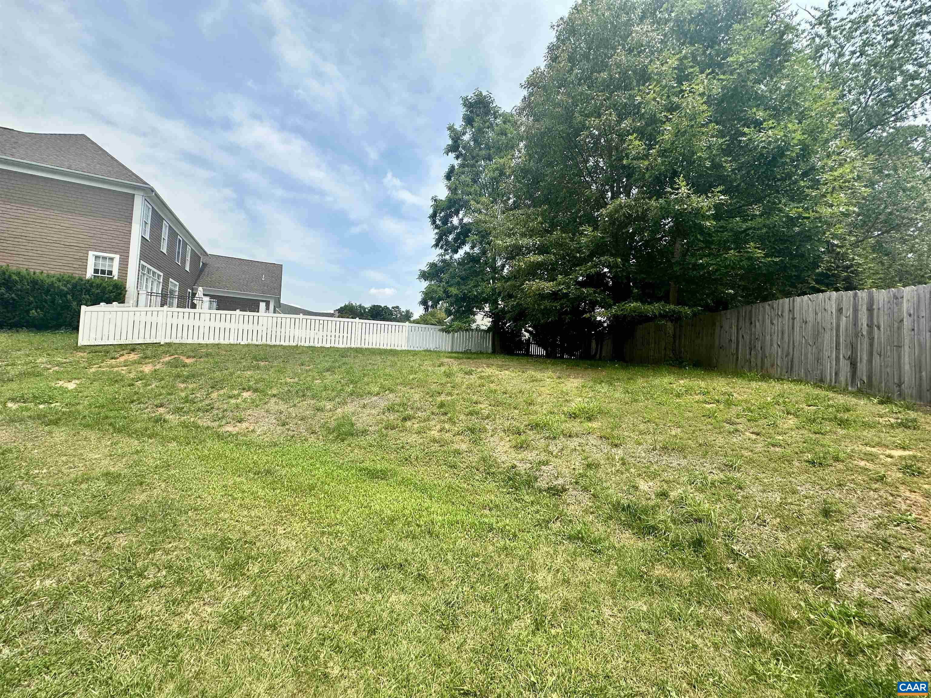 252 Millstream Drive Crozet, VA 22932 - Photo 40 of 41 a view of a backyard with a small cabin